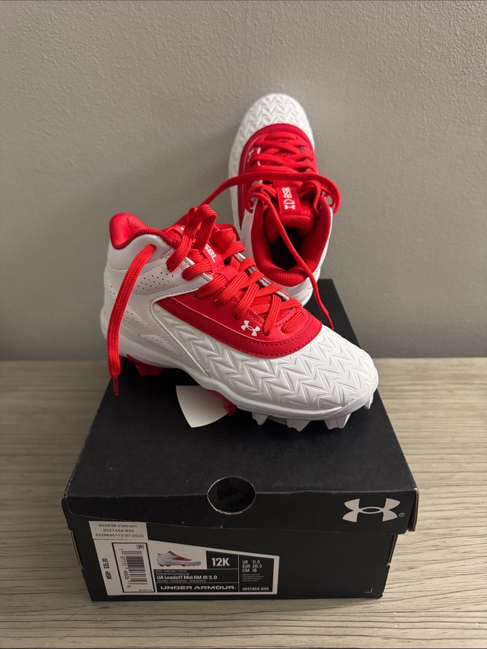 Kids UnderArmour Cleats